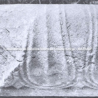 Tasos. Museu, inventário: 3207. Moldura decorada com folhas pendentes, separadas por um pequeno botão de lótus. Segundo quarto do século VI a.C. Foto:  École Française d'Athènes.
