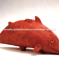 Askos de Cartago no formato de um golfinho. IV-III a.C. Terracota, 10,5 cm. Túnis, Museu do Bardo.